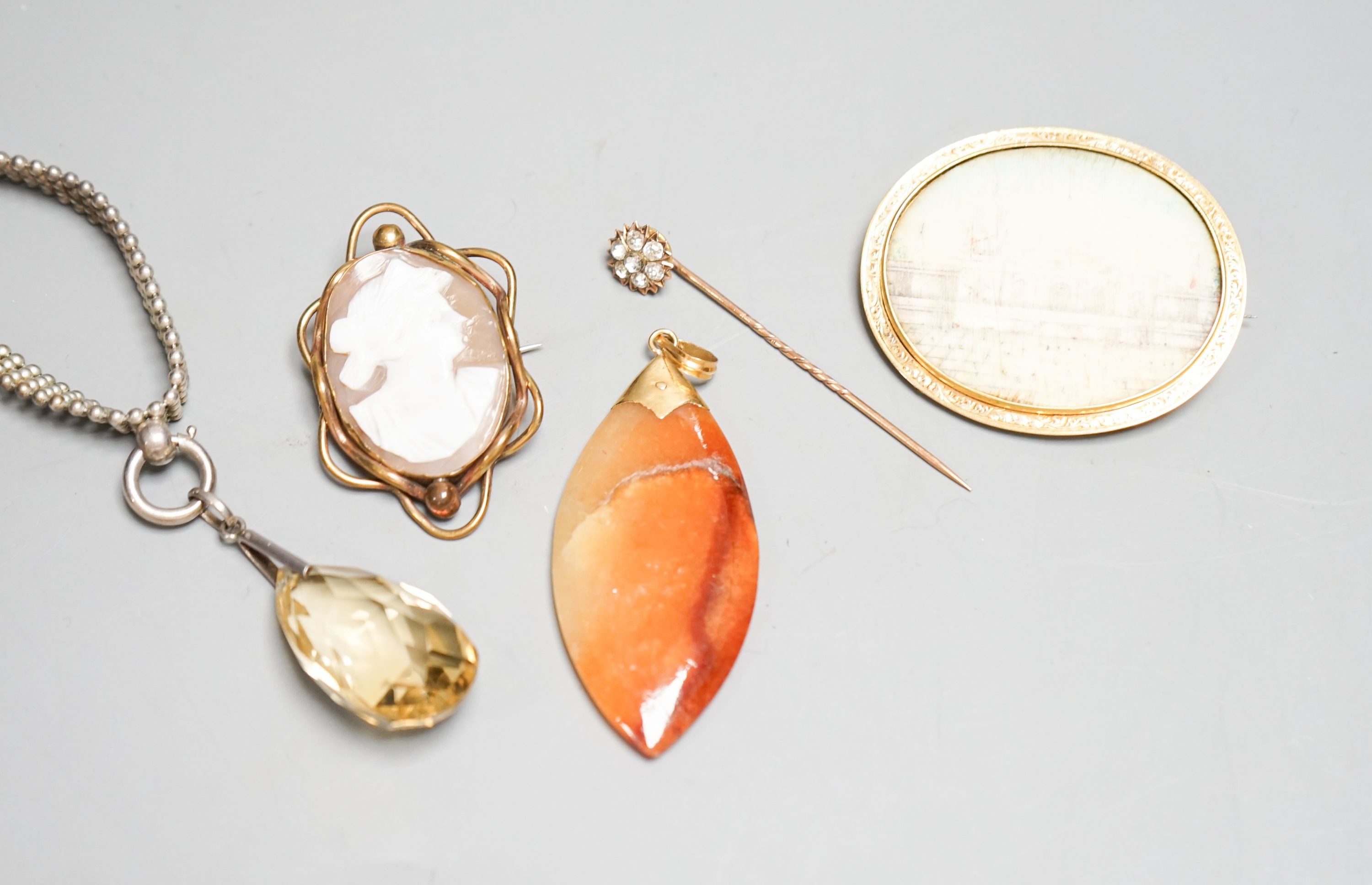 Mixed jewellery including cameo brooch, agate pendant, oval brooch, paste set stick pin and pendant on white metal chain.
